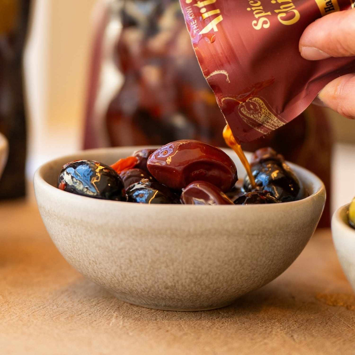 Four Flavours of Artisan Olives: Manuka Smoked, Sichuan Chilli, Truffle Oil, and Lemon Myrtle & Kawakawa