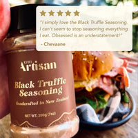 Jar of Kiwi Artisan Black Truffle Seasoning with a customer review overlay.